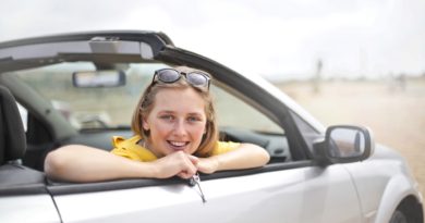 Person happy after buying new used car