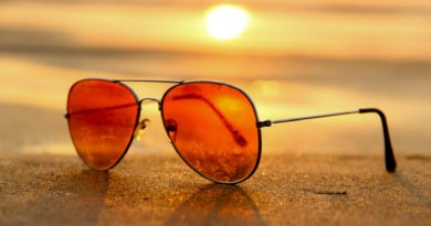 Summer sunglasses on a sunset