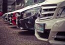 fleet of rental cars in a row